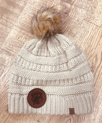 The Surfing Pig Women's Cream Winter  Hat with Leather Patch